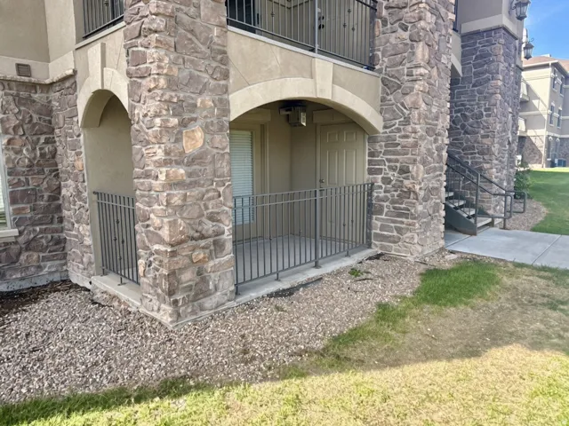 Stone veneer facade with arched architectural details