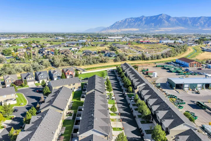 Expansive residential area featuring townhomes, single-family homes, and established landscaping