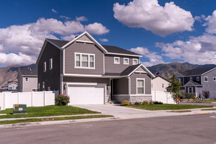 Contemporary gray siding exterior with white trim