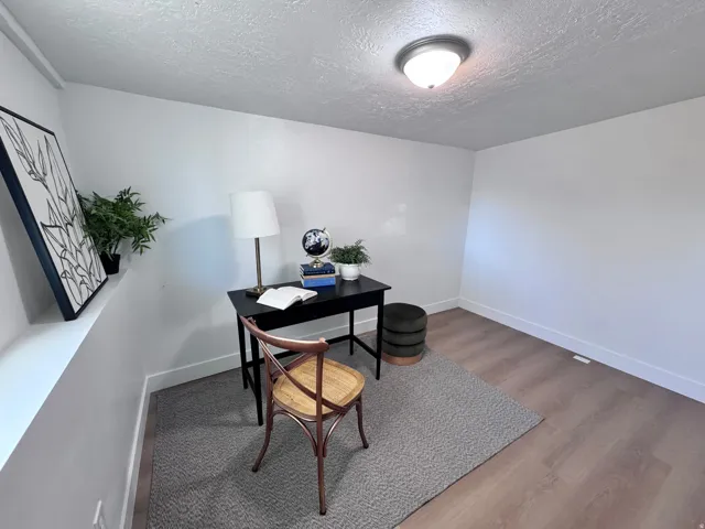 Recessed shelf feature, wood-finish flooring, white wall finishes, semi-flush mount ceiling light