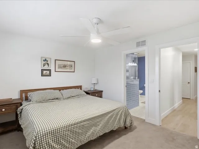 White walls and carpeted flooring