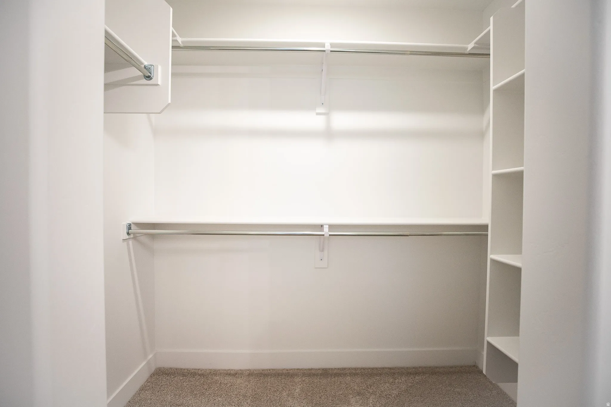 Large walk-in closet as part of primary suite.