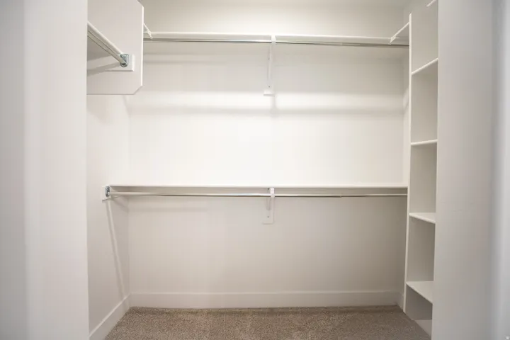Large walk-in closet as part of primary suite.