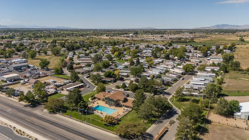 Community features a residential area, a recreational building, and an outdoor swimming pool with a surrounding hardscaping