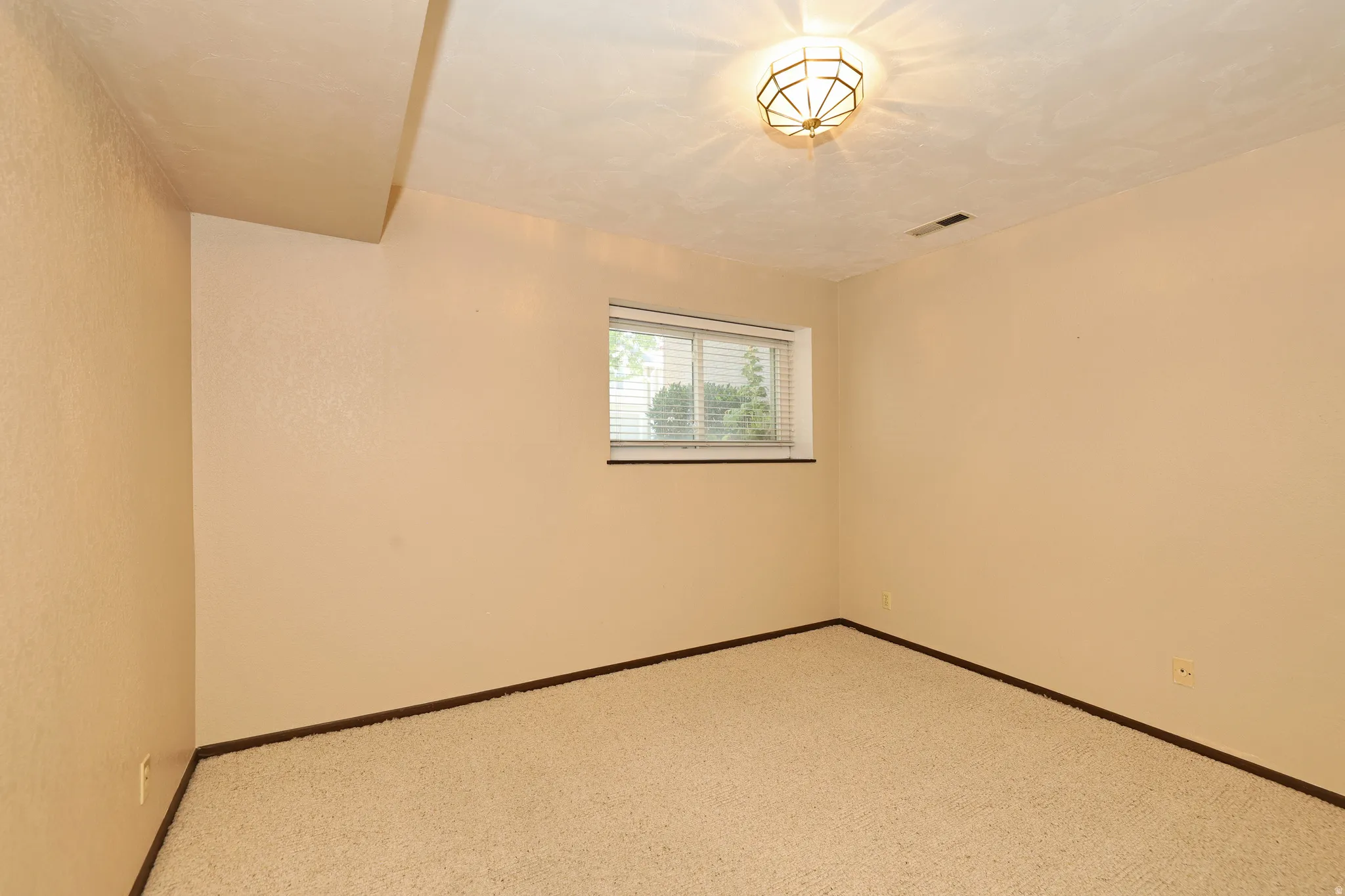 Neutral-toned walls with textured finish