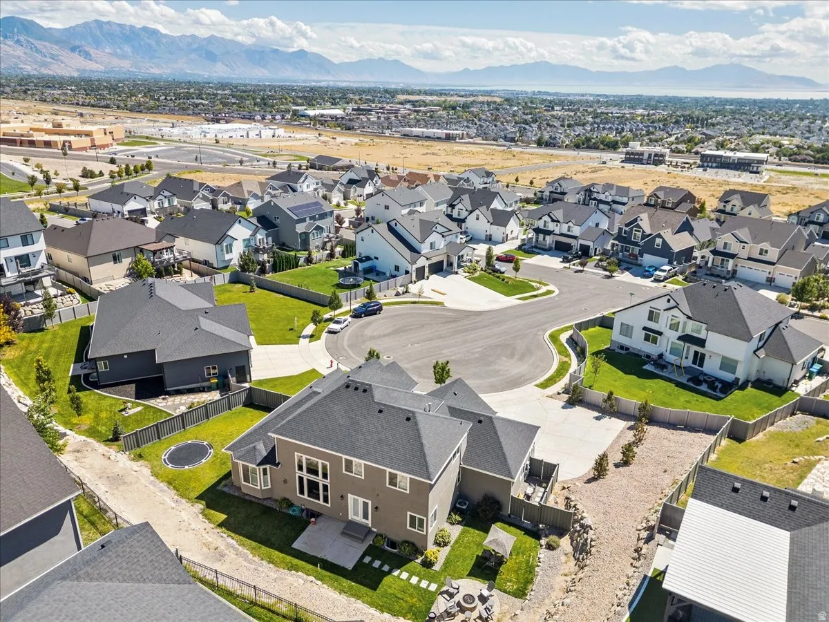 Modern residential development with mountain backdrop on a cul-de-sac
