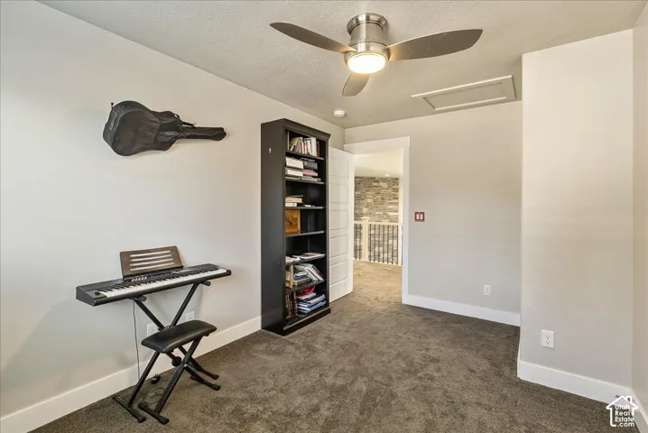 Recessed lighting, ceiling fan, and built-in shelving unit