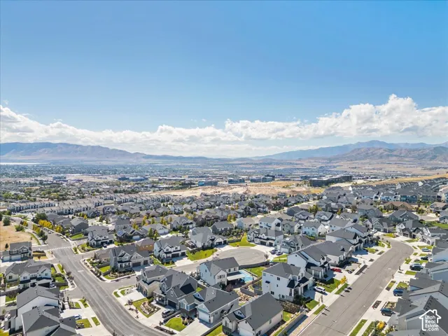 Expansive residential development with a network of paved streets and numerous detached homes