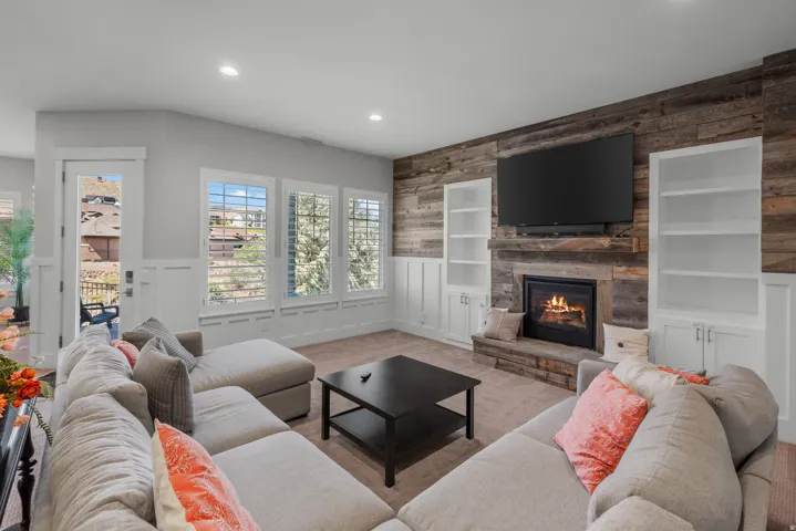 Reclaimed wood-finish accent wall with integrated fireplace