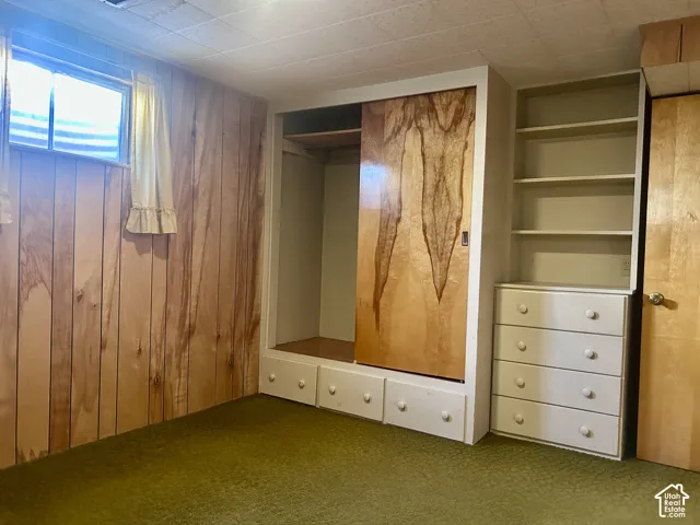 Bedroom #3 in the basement with lots of built-in drawers