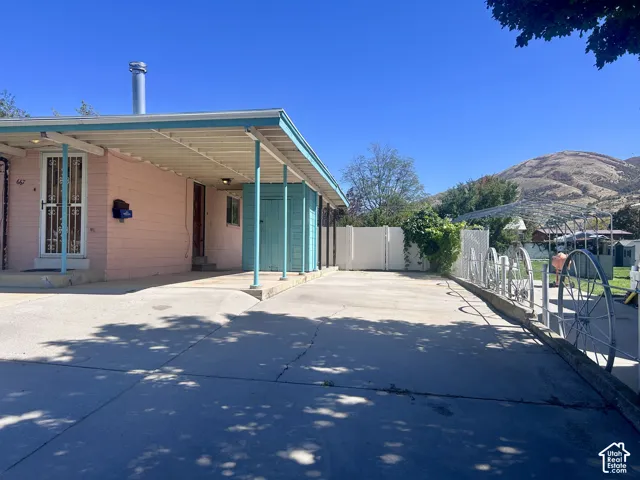 RV parking space and small shed at back of the carport