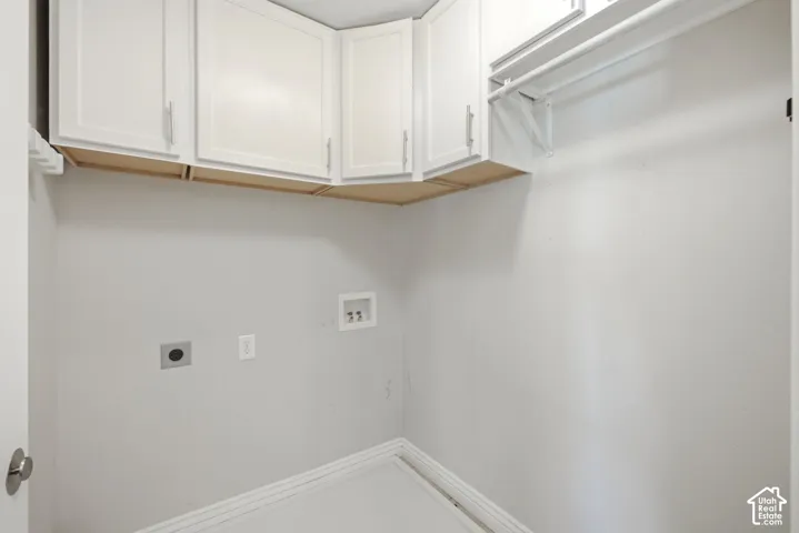 White cabinetry with silver-tone hardware