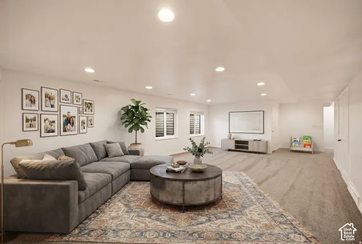Recessed ceiling lighting, neutral wall finishes, and multiple windows with blindsvirtual staging