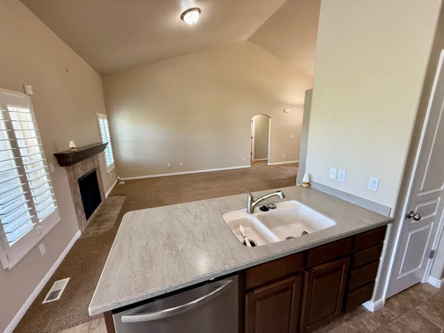 Great-room with fireplace and vaulted ceilings