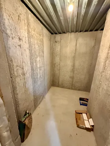 Cold storage room under front porch