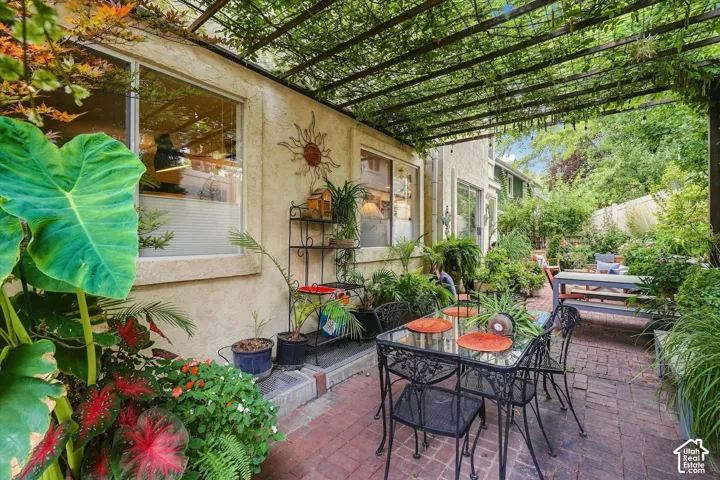 Custom-built Pergola with lush Wisteria vines
