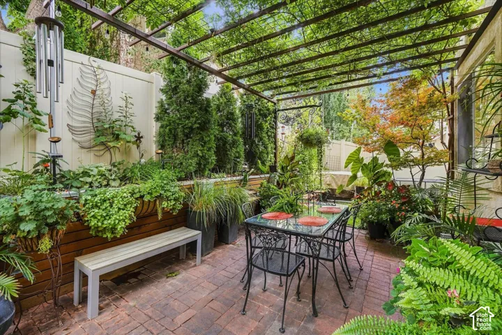 Custom-built Pergola with lush Wisteria vines