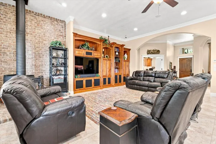 Brick accent wall with wood-burning stove