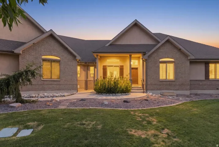 Brick and stucco exterior with gabled roof lines