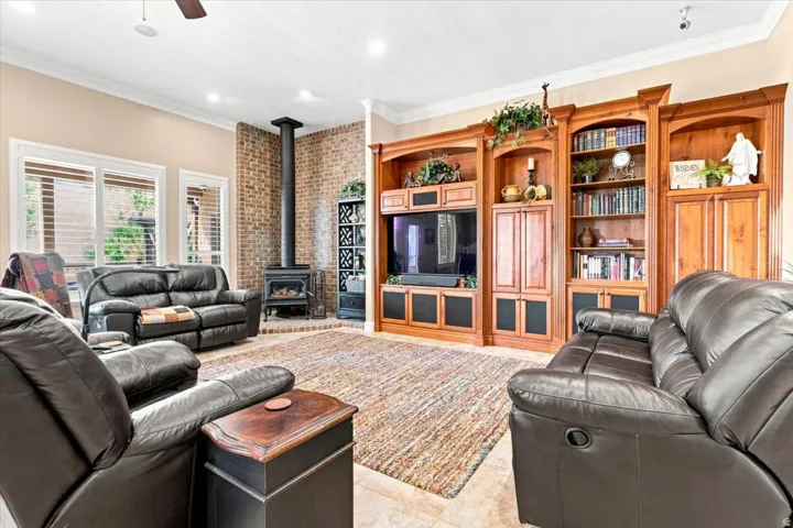 Brick accent wall with a freestanding wood-burning stove