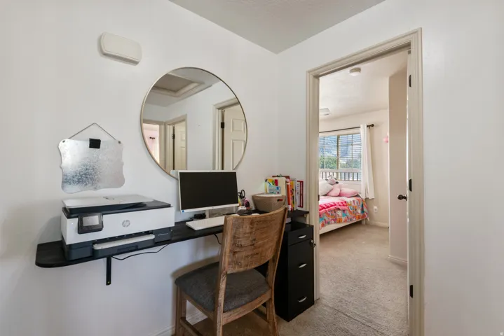 Wall-mounted desk with integrated storage