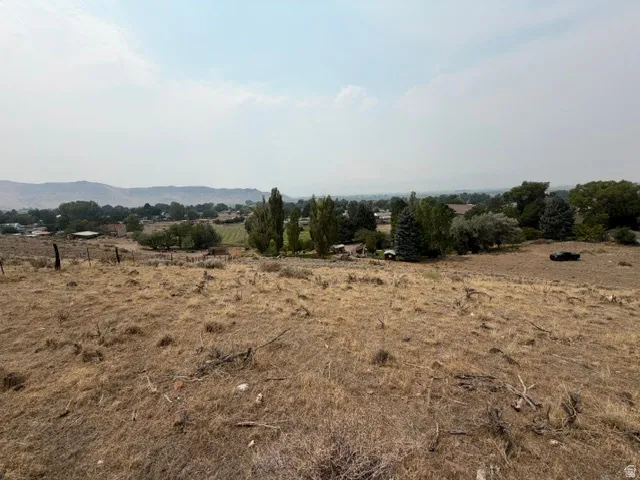 Expansive rural landscape with distant mountains