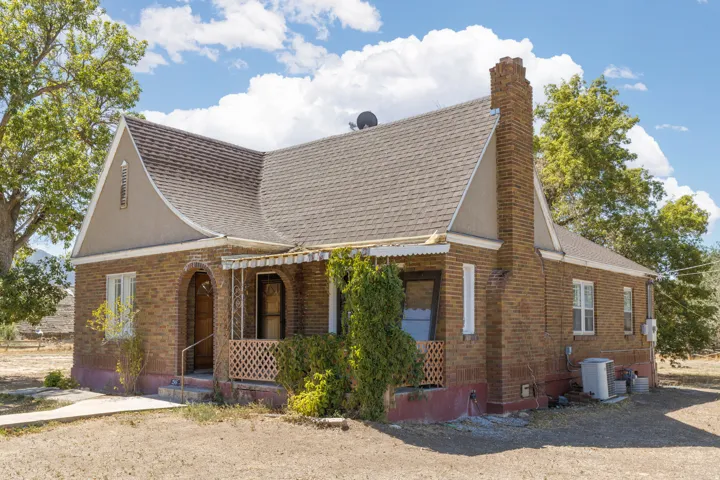 Brick exterior with a prominent brick chimney
