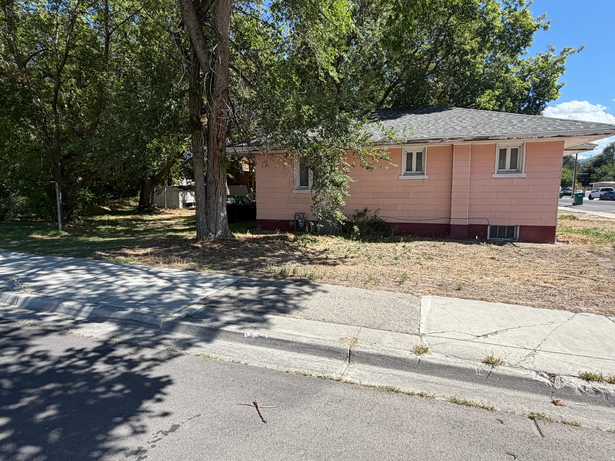 Property features horizontal siding, multiple windows, and a shingled roof