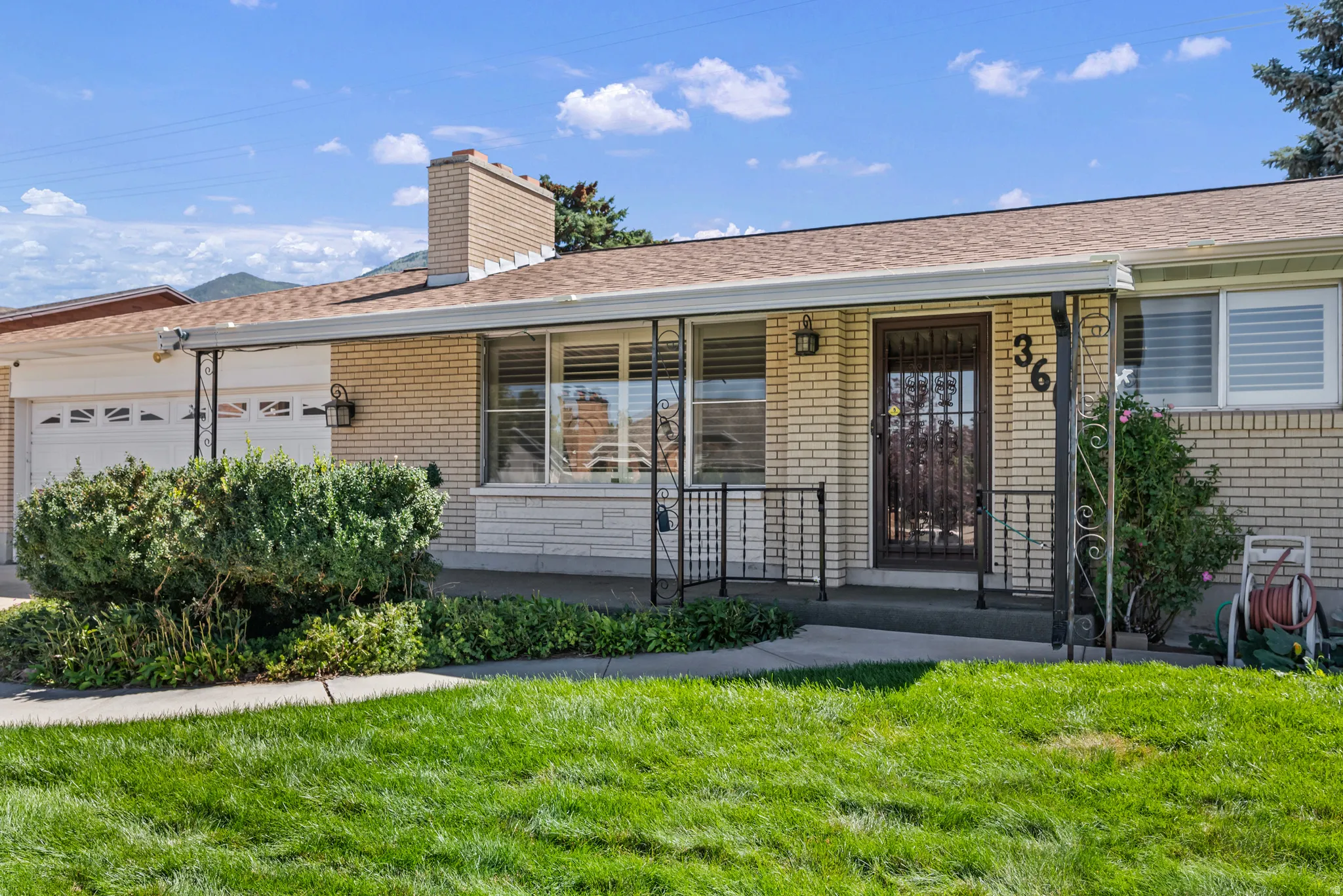 LOOK AT THE SIZE OF THE CUTE FRONT PORCH!