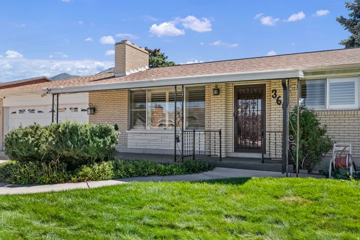 LOOK AT THE SIZE OF THE CUTE FRONT PORCH!