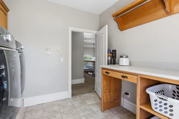 Built-in wood cabinetry with a light-toned countertop