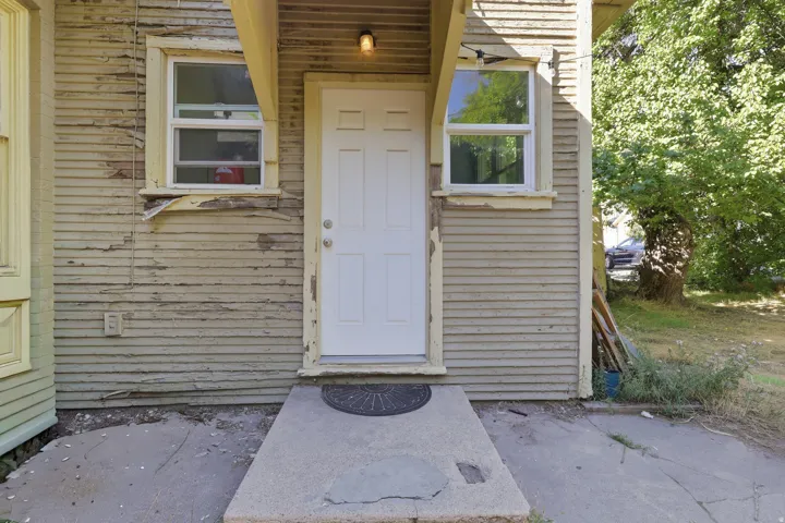 Entry door with a concrete landing