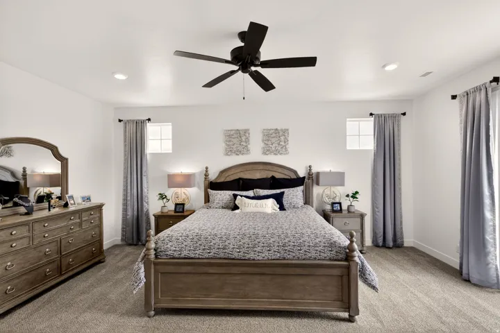 PHOTOS ARE OF A PREVIOUS MODEL HOME featuring the same floor plan and are provided for illustrative purposes only. Colors, finishes, fixtures, and selections may vary. Home will be delivered unfurnished.