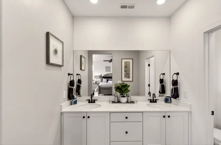 PHOTOS ARE OF A PREVIOUS MODEL HOME featuring the same floor plan and are provided for illustrative purposes only. Colors, finishes, fixtures, and selections may vary. Home will be delivered unfurnished.
