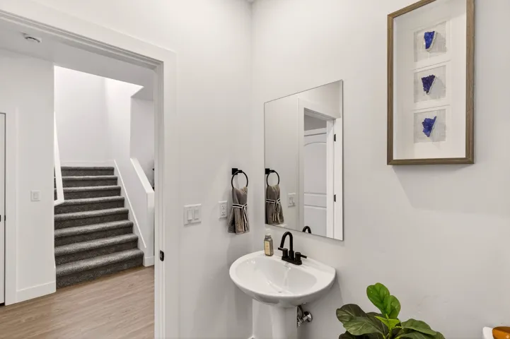 PHOTOS ARE OF A PREVIOUS MODEL HOME featuring the same floor plan and are provided for illustrative purposes only. Colors, finishes, fixtures, and selections may vary. Home will be delivered unfurnished.