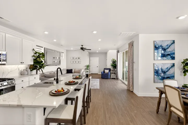 PHOTOS ARE OF A PREVIOUS MODEL HOME featuring the same floor plan and are provided for illustrative purposes only. Colors, finishes, fixtures, and selections may vary. Home will be delivered unfurnished.