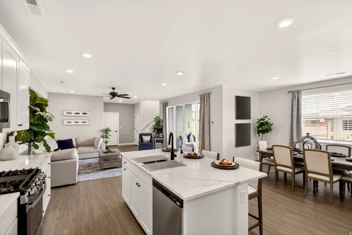 PHOTOS ARE OF A PREVIOUS MODEL HOME featuring the same floor plan and are provided for illustrative purposes only. Colors, finishes, fixtures, and selections may vary. Home will be delivered unfurnished.