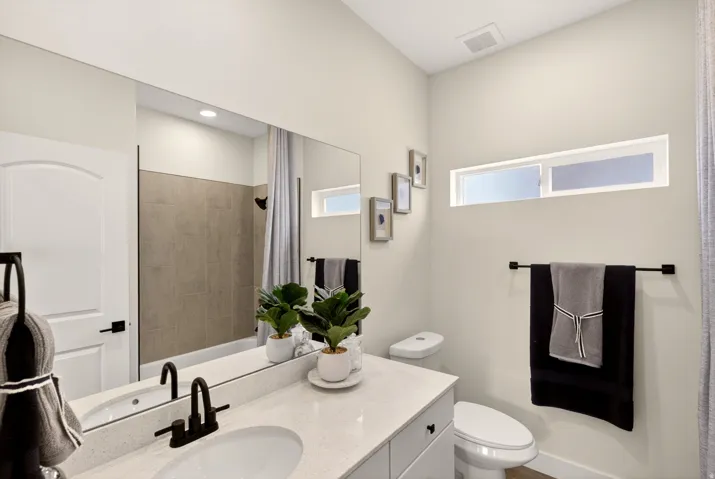 PHOTOS ARE OF A PREVIOUS MODEL HOME featuring the same floor plan and are provided for illustrative purposes only. Colors, finishes, fixtures, and selections may vary. Home will be delivered unfurnished.