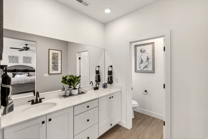 PHOTOS ARE OF A PREVIOUS MODEL HOME featuring the same floor plan and are provided for illustrative purposes only. Colors, finishes, fixtures, and selections may vary. Home will be delivered unfurnished.