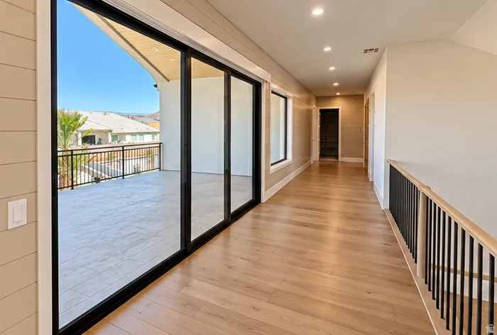 Hardwood-style flooring throughout the hallway
