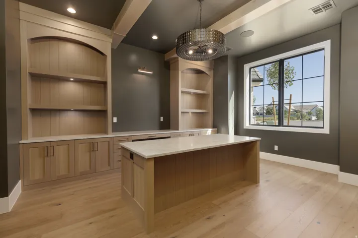 Built-in custom cabinetry with integrated shelving and countertop space