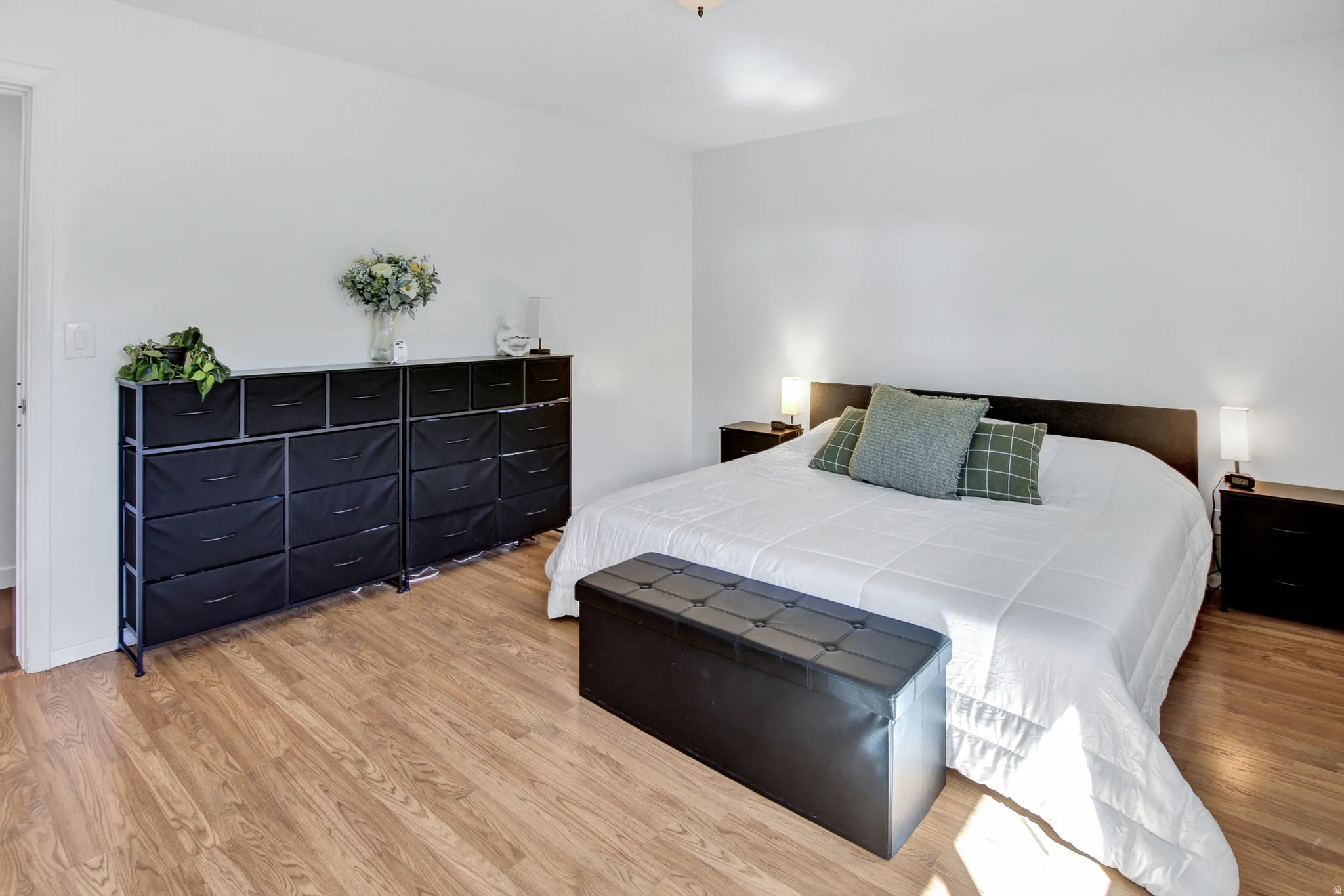 Wood-finish flooring with white walls