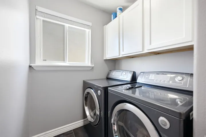 White shaker-style cabinetry with overhead storage