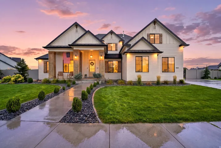 White-painted brick and board-and-batten exterior