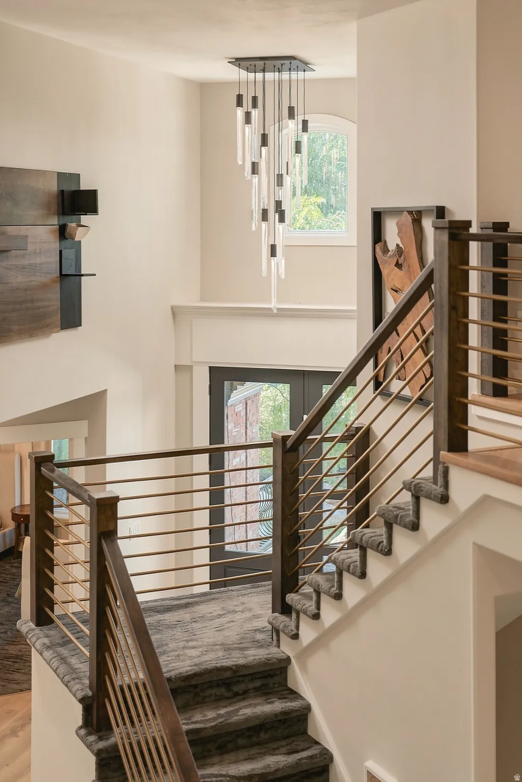 Contemporary chandelier with multiple glass elements