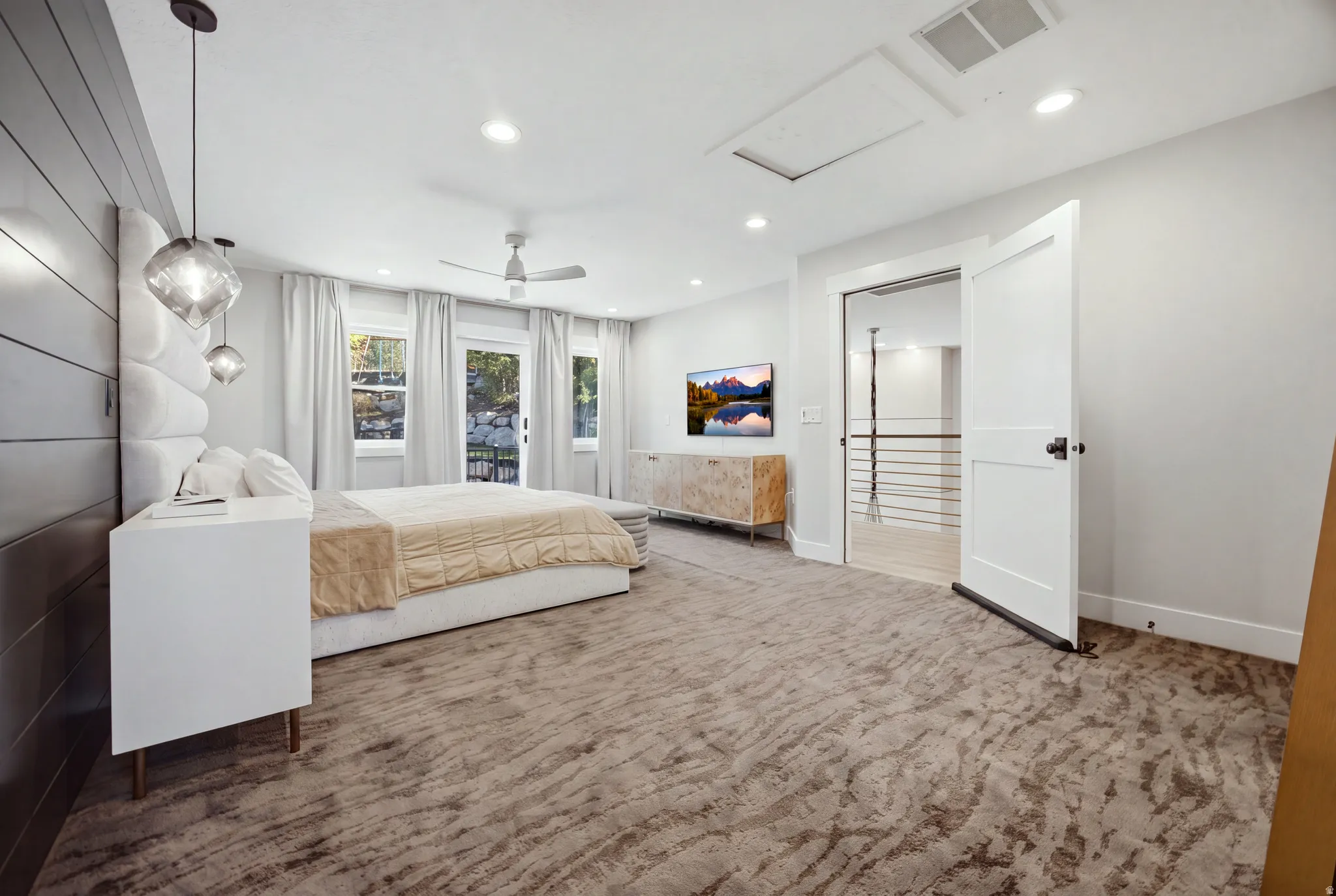 Recessed lighting, ceiling fan, and modern pendant lights