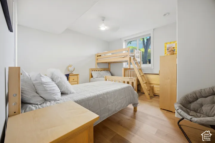 Light-filled room featuring wood-finish flooring and a bright window