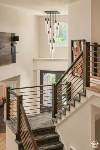 Contemporary chandelier with multiple glass elements