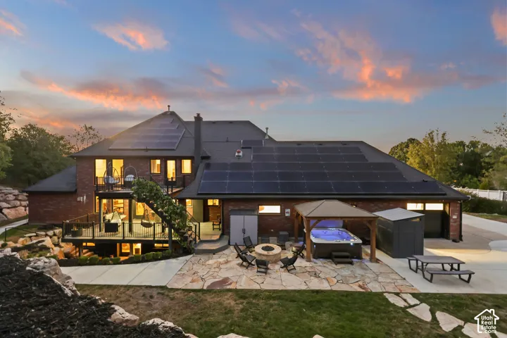 Brick exterior with multiple solar panel arrays