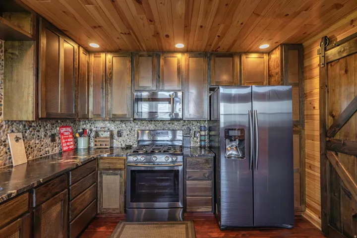 Wood-paneled ceiling with recessed lighting